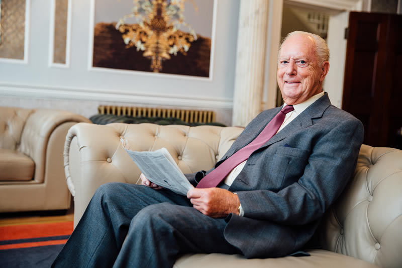 Dr Zybutz relaxing on waiting room chair